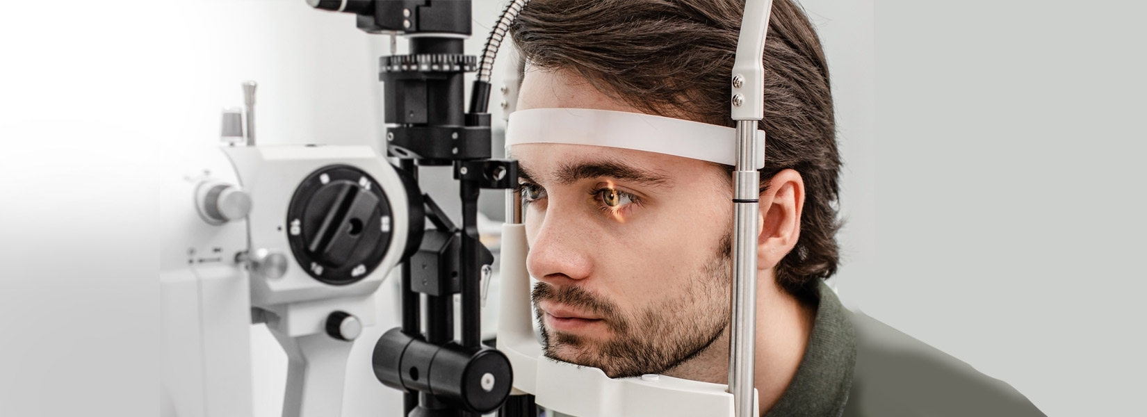young man during eye exam in Dayton